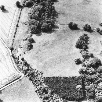 Oblique aerial view from NNW, centred on two L type hangars and the site of a third.