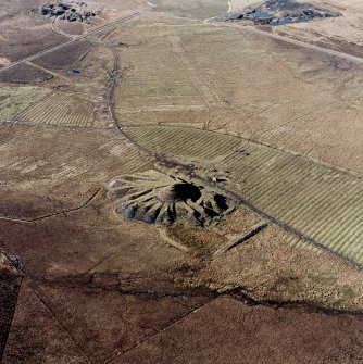 Lochend Colliery, oblique aerial view, taken from the ESE, showing the coal mine and spoil heap in the centre of the photograph, and an area of rig and plantation banks in the top half.