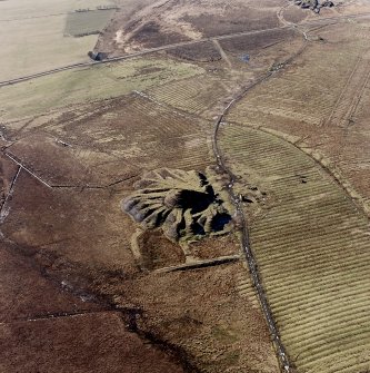 Lochend Colliery, oblique aerial view, taken from the NE, showing the coal mine and spoil heap in the centre of the photograph, and an area of rig and plantation banks in the right half.