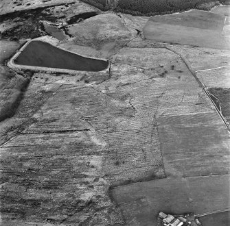 Gair and Bogside, oblique aerial view, taken from the SW, showing rig and furrow cultivation in the centre of the photograph, and Bogside farmstead at the bottom edge.