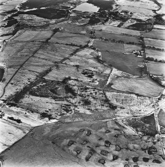 Strathavon, Nappyfaulds and Dyke, oblique aerial view, taken from the WSW, showing Nappyfaulds farmstead and an area of rig, and Strathavon coal mine in the centre of the photograph, and the location of Dyke open-cast mining at the bottom.