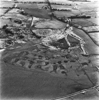 Dyke, Nappyfaulds and Strathavon, oblique aerial view, taken from the WSW, showing the area of open-cast mine at Dyke in the centre of the photograph, an area of rig in the top left, and Strathavon coal mines and coke ovens across the top.