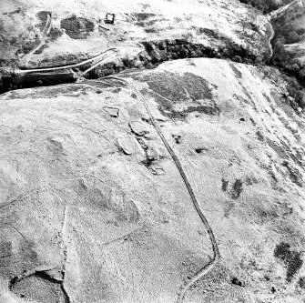 Oblique aerial view of Third and Second Inchna Burns centred on the remains of an archaeological landscape, taken from the NNW.