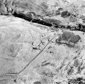 Oblique aerial view of Third and Second Inchna Burns centred on the remains of an archaeological landscape, taken from the W.