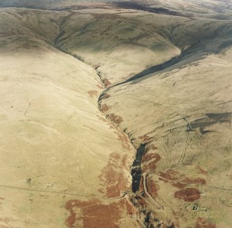 Oblique aerial view of Third and Second Inchna Burn centred on the remains of archaeological landscapes, taken from the SW.