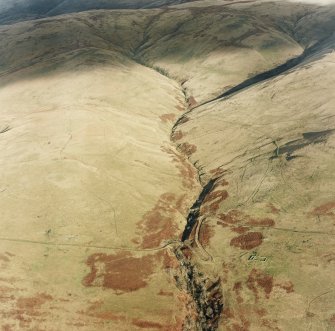 Oblique aerial view of Third and Second Inchna Burn centred on the remains of archaeological landscapes, taken from the SW.