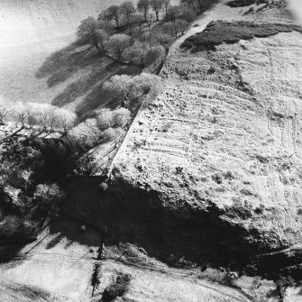 Gormyre Hill, oblique aerial view, taken from the N, showing two square enclosures in the right half of the photograph.
