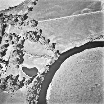 West Lindsaylands, oblique aerial view, taken from the SW, centred on the cropmarks of a fort or causewayed enclosure.