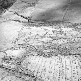 Morton Hill, oblique aerial view, taken from the NW, showing an area of rig in the centre and bottom half of the photograph.