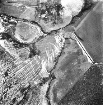 Oblique aerial photograph centred on cultivation terraces and cultivation remains from S.