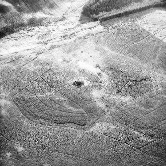 Oblique aerial view, centred on 'Nether Cairn'.