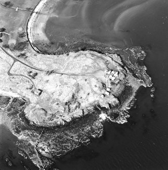 Oblique aerial view of Charles Hill centred on a coast battery with a ferry-house cellar adjacent, taken from the S.