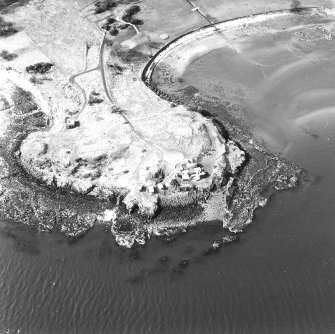Oblique aerial view of Charles Hill centred on a coast battery with a ferry-house cellar adjacent, taken from the SE.