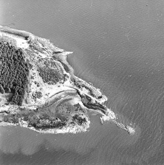 Oblique aerial view of Braefoot Point centred on a coast battery, taken from the W.