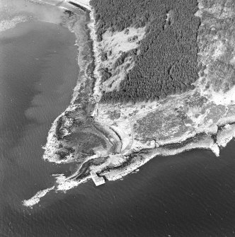 Oblique aerial view of Braefoot Point centred on a coast battery, taken from the SE.