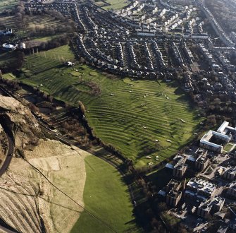 Oblique aerial view of Prestonfield centred on a golf course and rig, taken from the NNW.