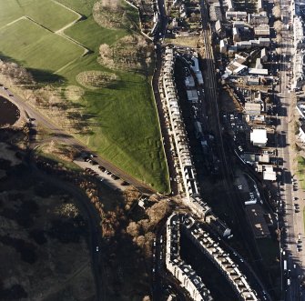 Oblique aerial view of Holyrood Park centred on possible air raid shelters, taken from the E.