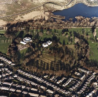 Oblique aerial view of Prestonfield centred on a golf course and rig with Prestonfield House and stables adjacent, taken from the SW.