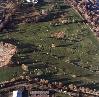 Oblique aerial view of Prestonfield centred on a golf course and rig, taken from the SE.