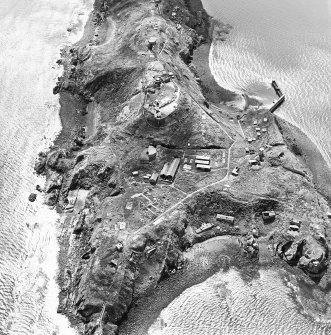 Oblique aerial view of Inchkeith Island centred on the defences, taken from the NNW.