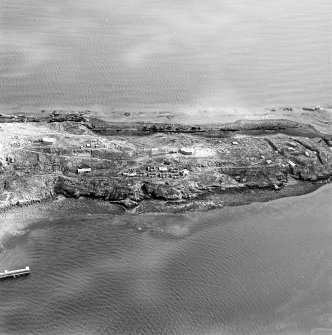 Oblique aerial view of Inchkeith Island centred on the defences, taken from the SW.