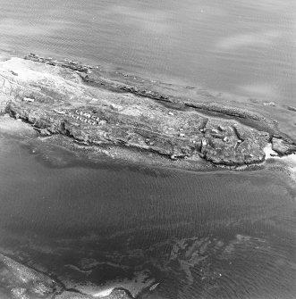 Oblique aerial view of Inchkeith Island centred on the defences, taken from the SW.