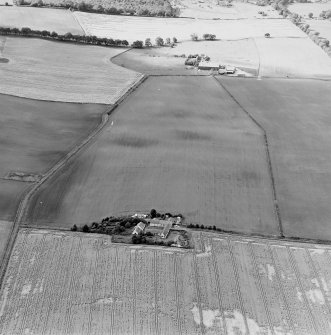 Oblique aerial view centred on the cropmarks of coal pits, taken from the ENE.