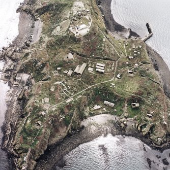 Oblique aerial view of Inchkeith Island centred on the defences, taken from the NNW.