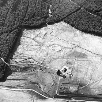 Oblique aerial view centred on the remains of the motte, taken from the SE