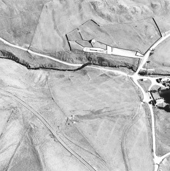 Oblique aerial view centred on the remains of the deserted settlement, taken from the N.