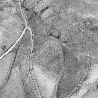 Oblique aerial view centred on the remains of the possible field-system, taken from the SE.