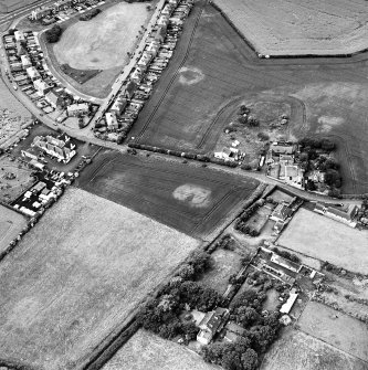 Hope Cottage, oblique aerial view, taken from the ESE, centred on the cropmarks of a possible enclosure.