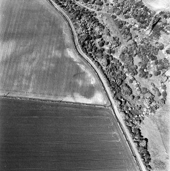 Pardivan, oblique aerial view, taken from the SSE, centred on the cropmark of an enclosure.