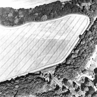 Vogrie Grange, oblique aerial view, taken from the SSE, centred on the cropmark of a possible settlement. The West Lodge, Vogrie House is visible in the bottom centre half of the photograph.