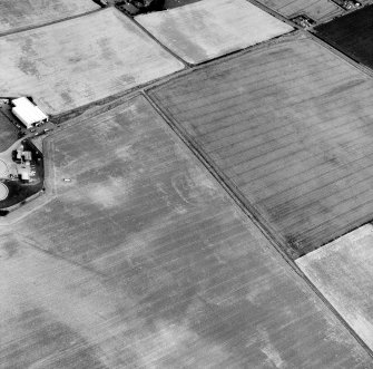 Howe Mire, settlement and cropmarks and Barbachlaw, enclosure, cultivation remains and cropmarks: oblique air photograph