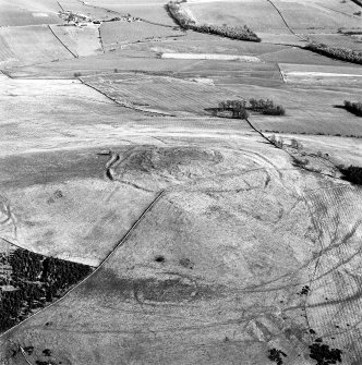 Aerial view of Bonchester Hill fort, settlement and cultivation remains and Bonchester Hill enclosure, taken from the NW.