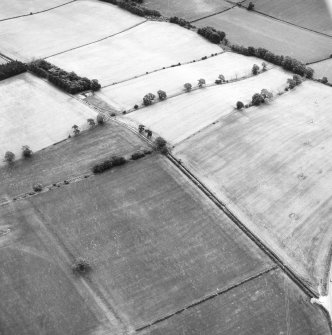 Newstead, Roman fort and temporary camps: air photograph showing enclosure (NT 567 336) and 40--acre temporary camp (NT 570 337).
