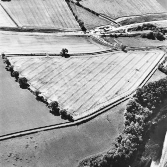 Newstead, oblique aerial view, taken from the NNE, centred on the Roman fort and the western and southern annexes. The Newstead by-pass (under construction) is visible in the top half of the photograph.

