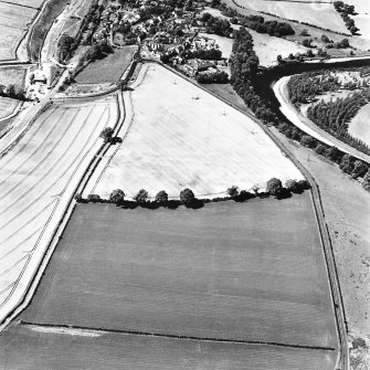 Newstead, oblique aerial view, taken from the ENE, centred on the Roman fort and the western and southern annexes. Newstead village and by-pass (under construction) are visible in the top right-hand corner of the photograph.
