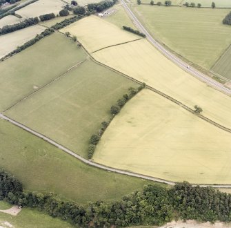 Newstead, oblique aerial view, taken from the NW, centred on the Roman fort and western annexe.