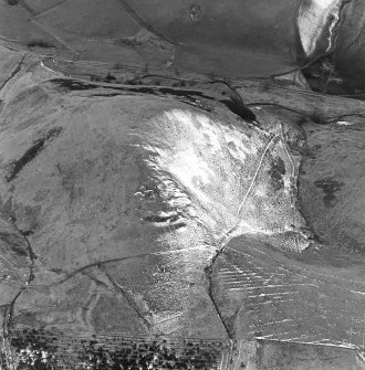 Oblique aerial view of Kelphope Burn centred on the fort and settlement, taken from the ENE.