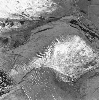 Oblique aerial view of Kelphope Burn centred on the fort and settlement, taken from the NE.