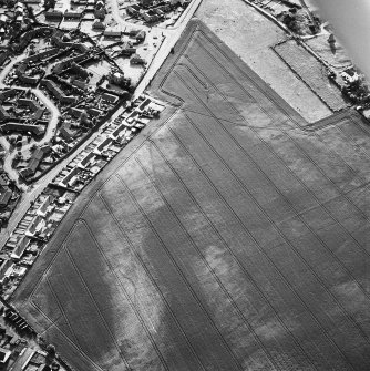 Oblique aerial view of cropmarks including linear croparks and pits, taken from the E.