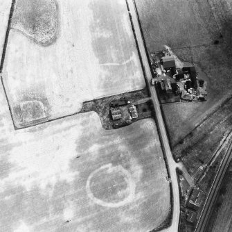 Oblique aerial view showing the cropmark of a possible enclosure, East Fortune.
