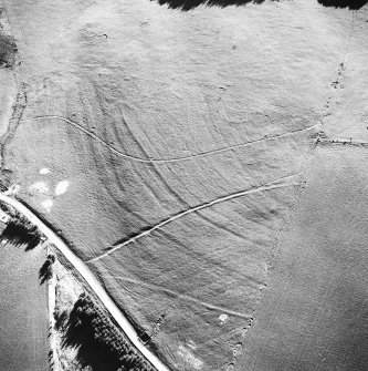 Aerial view of the route of the Wheel Causeway, centred on 6010 0861, and rig, taken from the NNE.
