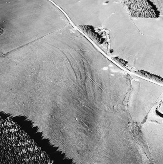 Aerial view of the route of the Wheel Causeway, centred on 6010 0861, and rig, taken from the SW.