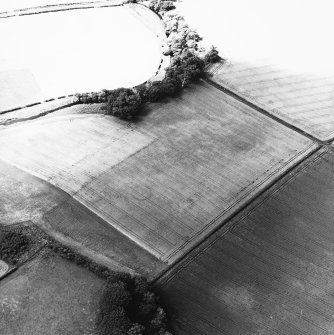 Cappuck Bridge, oblique aerial view taken from the ESE, centred on the cropmark of a circular enclosure.