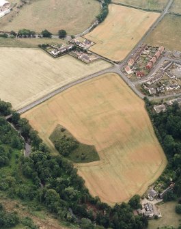 Oblique aerial photograph of Mantle Walls, taken from the NNE, centred on cropmarks that are thought to represent the location of an episcopal palace.