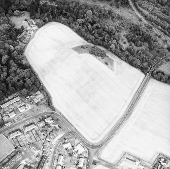 Mantle Walls, oblique aerial view, taken from the SW, centred on cropmarks that are thought to represent the location of an episcopal palace.