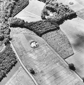 Brox Law, oblique aerial view, taken from N, centred on the cropmark of a fort which is partially overlain by a pond.